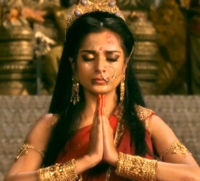 Krishna protects Draupadi